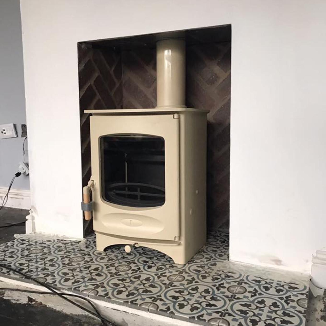 Herringbone chamber with charnwood stove 